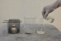Fill nitric acid into clean water